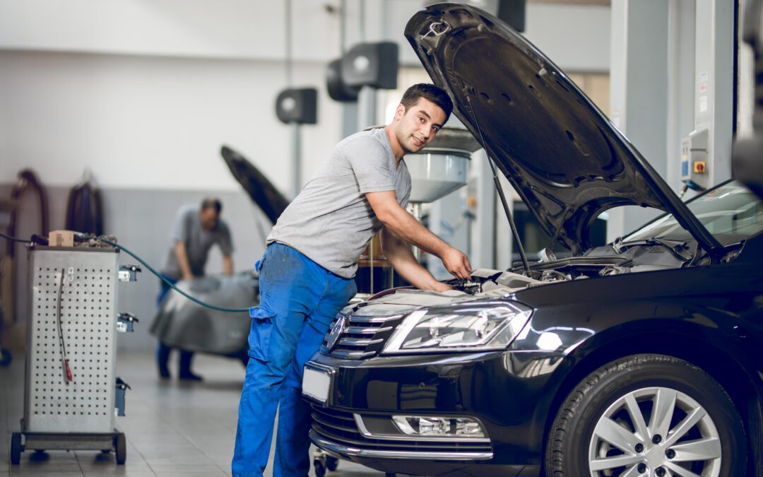 Certified German auto repair technician working on a BMW vehicle in Rockville.